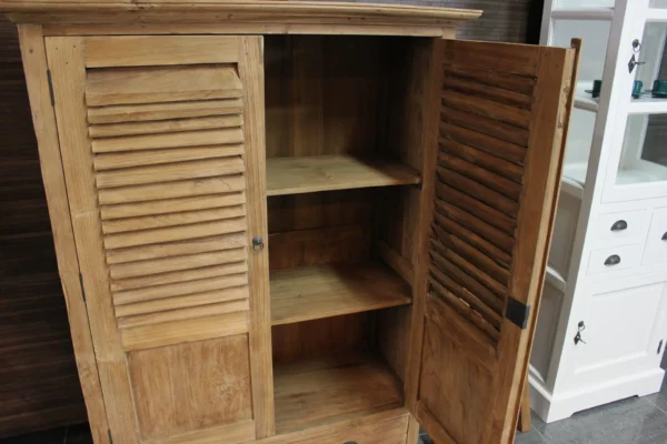 Exclusive teak cabinet with louvered doors. This unique teak wall cabinet is handcrafted in Indonesia - furniture store TEAK2.